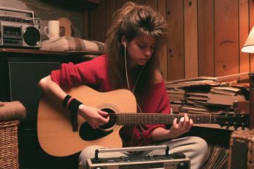 A young female songwriter practicing her craft in 1989